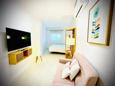 Cama o camas de una habitación en Apartamentos Guerrero
