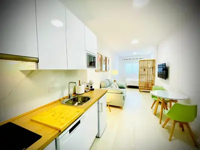 Una cocina o zona de cocina en Apartamentos Guerrero