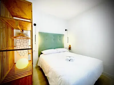 Cama o camas de una habitación en Apartamentos Guerrero