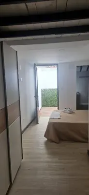 Cama o camas de una habitación en Hostal del Currante Babilafuente