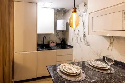 Una cocina o zona de cocina en Urban Estudios Canterias