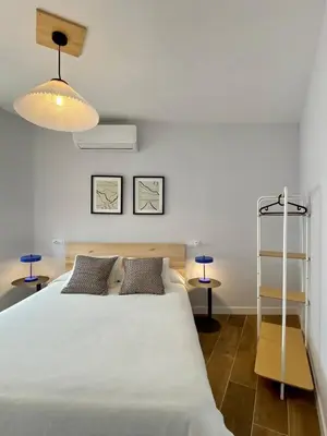 Cama o camas de una habitación en Avila Centro I