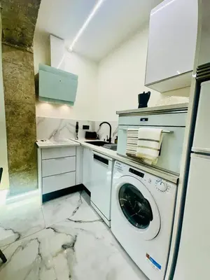 Una cocina o zona de cocina en Imperium Boutique Centro Parking Gratis