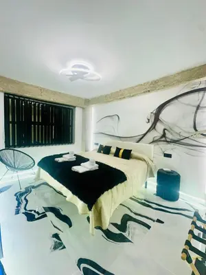 Cama o camas de una habitación en Imperium Boutique Centro Parking Gratis