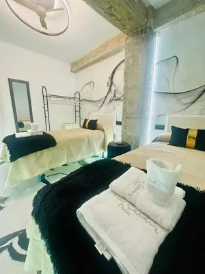 Cama o camas de una habitación en Imperium Boutique Centro Parking Gratis
