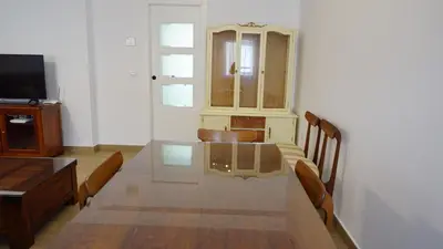 Una televisión o centro de entretenimiento en Apartamento La Pina