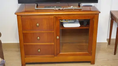 Una televisión o centro de entretenimiento en Apartamento La Pina