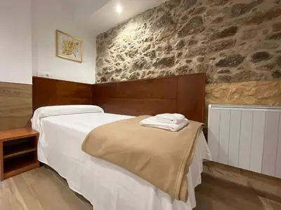 Cama o camas de una habitación en Mar de Nubes Piornal I entre el Valle del Jerte y La Vera