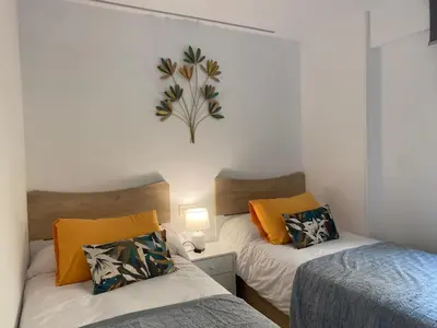 Cama o camas de una habitación en Apartamento Turístico HUGO DE PILAR