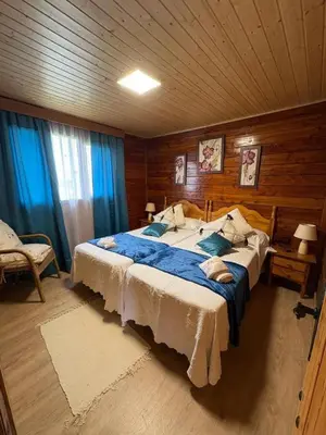 Cama o camas de una habitación en La CABAÑA