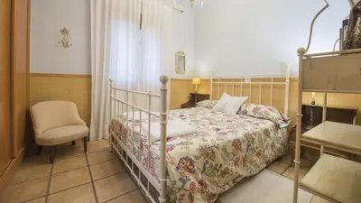 Cama o camas de una habitación en Casa Rural Hoz de la Pinilla