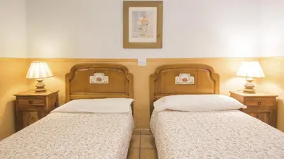 Cama o camas de una habitación en Casa Rural Hoz de la Pinilla