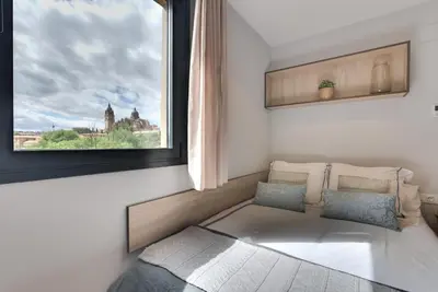 Cama o camas de una habitación en Livensa Living Salamanca Albergue Juvenil