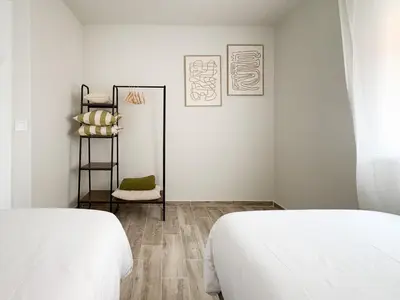 Cama o camas de una habitación en ChillaHomes 003