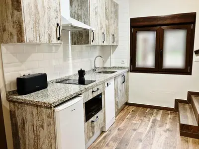 Una cocina o zona de cocina en Los Nidos de Nines