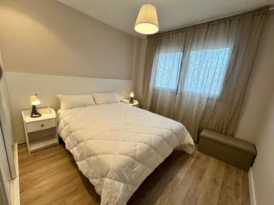 Cama o camas de una habitación en Apartamentos Titus Decimus