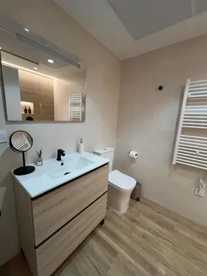 Un baño de Apartamentos Titus Decimus