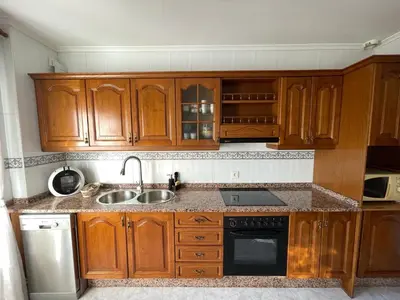 Una cocina o zona de cocina en Vivienda turística El Mirador de la Abuela