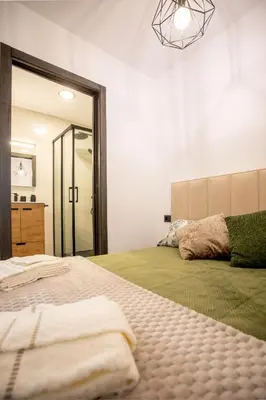 Cama o camas de una habitación en Apartamento Suite Puerta del Sol II