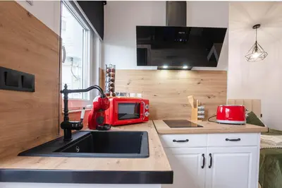 Una cocina o zona de cocina en Apartamento Suite Puerta del Sol II