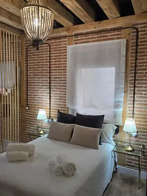 Cama o camas de una habitación en Apartamentos propia Plaza Mayor collection Luxury