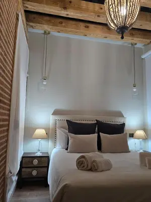 Cama o camas de una habitación en Apartamentos propia Plaza Mayor collection Luxury