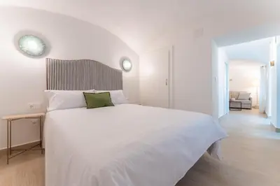 Cama o camas de una habitación en Apartamentos Turísticos Zibá