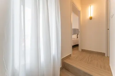 Cama o camas de una habitación en Apartamentos Turísticos Zibá