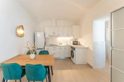 Una cocina o zona de cocina en Apartamentos Turísticos Zibá