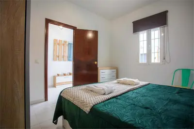 Cama o camas de una habitación en Apartamento Casa Puerta del Sol I
