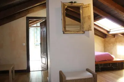 Cama o camas de una habitación en Cabachuelas I casas rurales