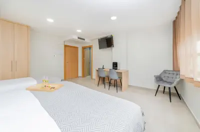 Cama o camas de una habitación en Hostal-SPA Mare Nostrum