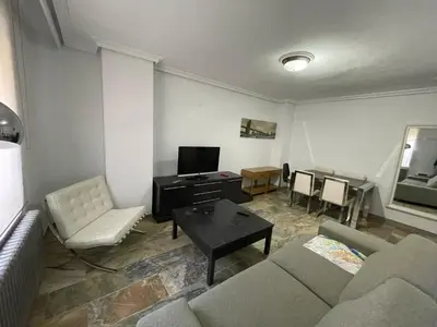 Una televisión o centro de entretenimiento en Piso Amplio en el Centro de Salamanca, TV, WiFi