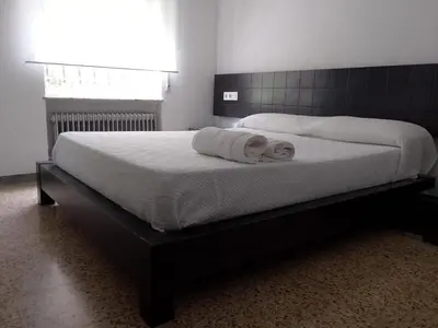 Cama o camas de una habitación en Piso Amplio en el Centro de Salamanca, TV, WiFi
