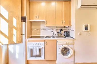 Una cocina o zona de cocina en San Justo Suites