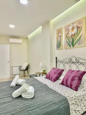 Cama o camas de una habitación en La Beltraneja XIII Apartamento con encanto en el casco histórico