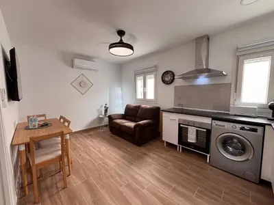 Una cocina o zona de cocina en Apartamentos Cañada Sierra 23