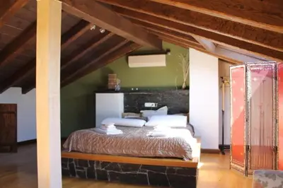 Cama o camas de una habitación en Las cabachuelas casas rurales
