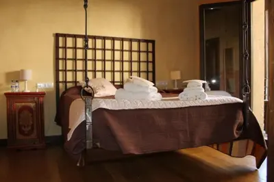 Cama o camas de una habitación en Las cabachuelas casas rurales
