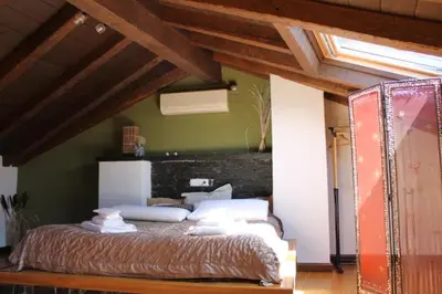 Cama o camas de una habitación en Las cabachuelas casas rurales