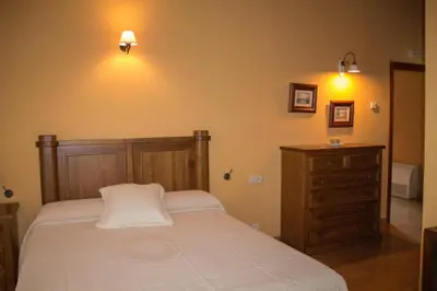 Cama o camas de una habitación en Casa Rural La Flor del Naranjo