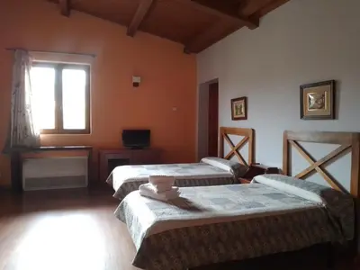 Cama o camas de una habitación en Casa Rural La Flor del Naranjo