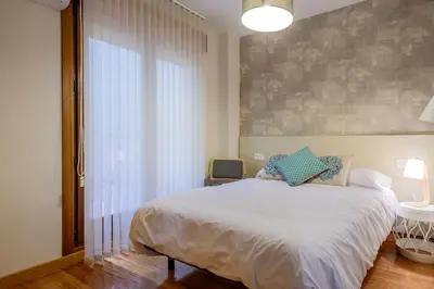 Cama o camas de una habitación en San Nicolás parking gratuito