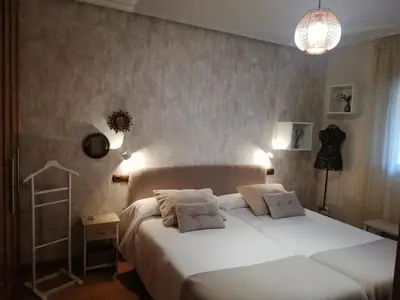 Cama o camas de una habitación en Apartamento con jardín privado a 10 min del centro de Salamanca