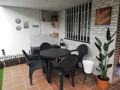 Zona de estar de Apartamento con jardín privado a 10 min del centro de Salamanca