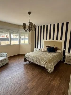 Cama o camas de una habitación en La casa amarilla