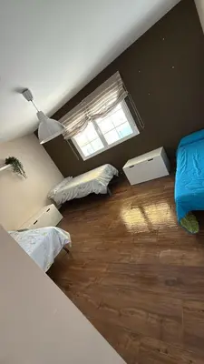 Cama o camas de una habitación en La casa amarilla