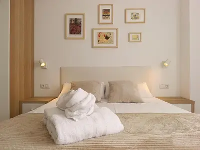 Cama o camas de una habitación en Destino Deluxe Helga Cáceres