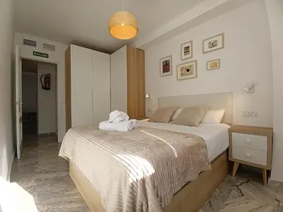 Cama o camas de una habitación en Destino Deluxe Helga Cáceres