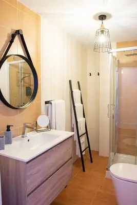 Un baño de Apartamentos Eras Centro